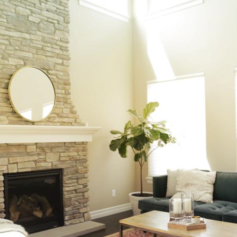 Living room with stone fireplace